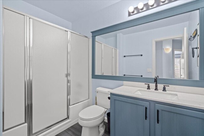 Building Photo - Multiple Living Areas 4-Bedroom Retreat with Vaulted Ceilings & No Carpet