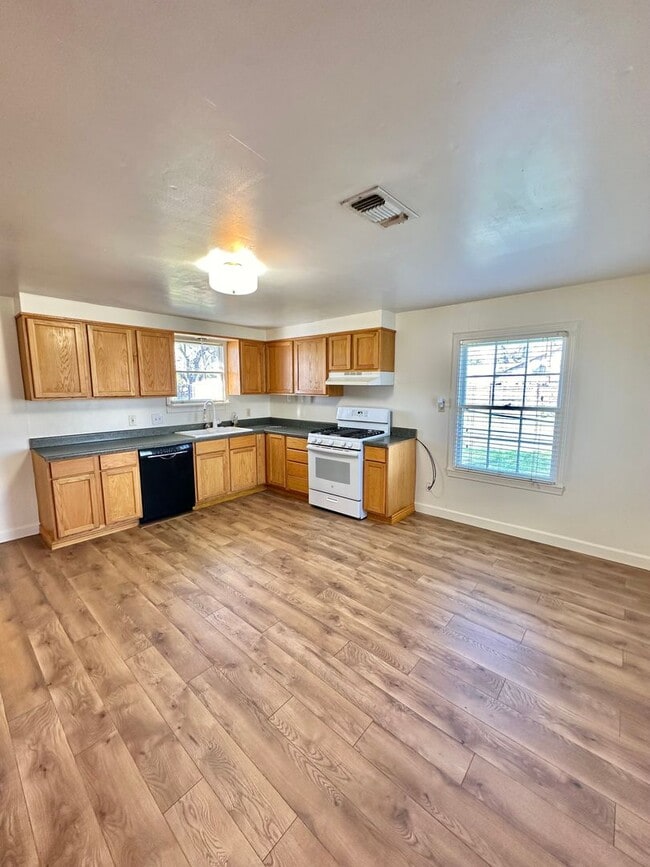 Building Photo - COMING MAY 2026! Charming 4-Bedroom Home + Huge Lot!