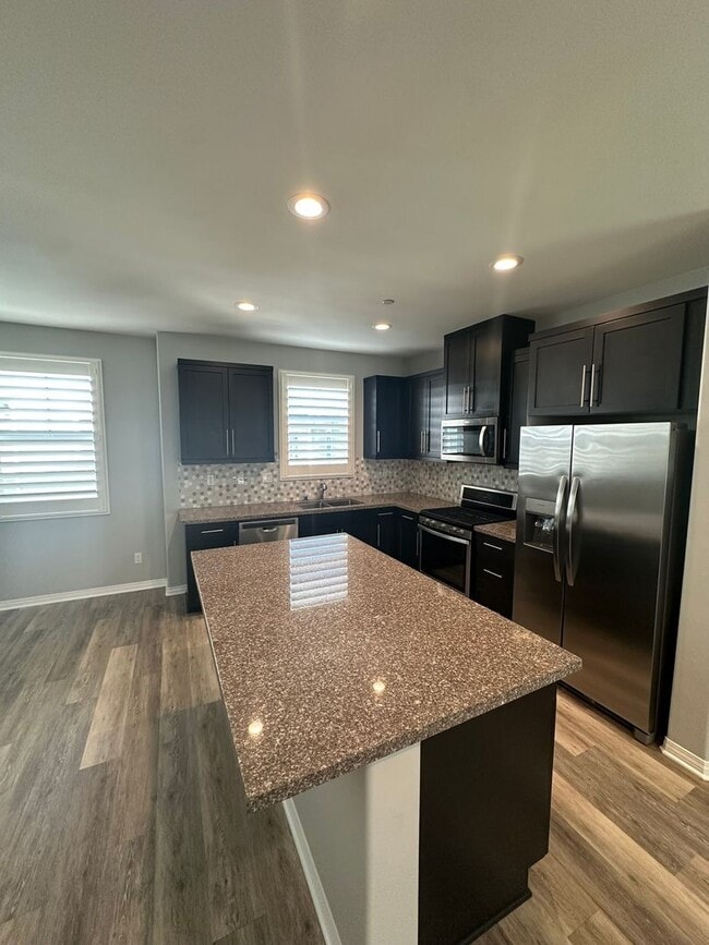 Building Photo - BAYSIDE LANDING - Available Now! 3-story t...