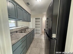 Building Photo - 4911 Tennyson Dr