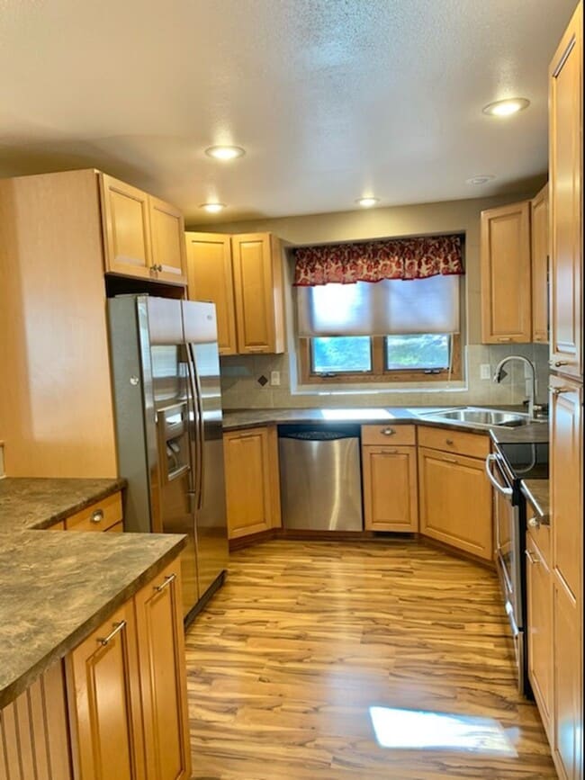 Building Photo - Exceptional 2 Bedroom, 2 Bath Ranch Townhome with 2 Car Attached Garage in Fort Collins, CO