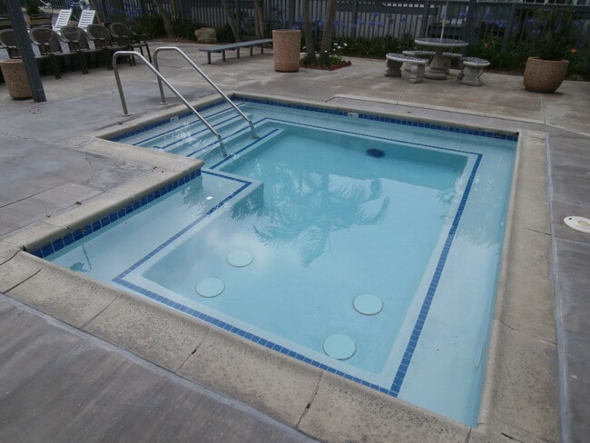 Building Photo - Upstairs Studio Condo in Huntington Harbor...
