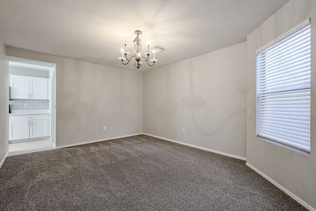 Building Photo - Introducing a stunning 4-bedroom, 2.5-bath...