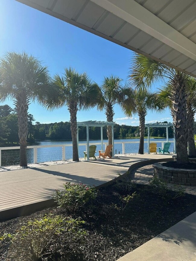 Building Photo - Partially Furnished Lakefront Retreat in Sunset Bay – Stunning Views & Resort-Style Amenities