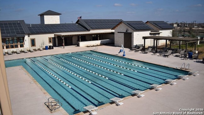 Building Photo - *COMING SOON* 3-Bedroom with Solar Panels & Resort Amenities – Pool, Gym!