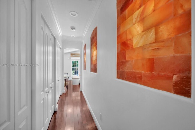 9 / 42Himalayan salt wall with lights grace the hallway leading to primary suite. Creates sultry & s - 1109 NE 3rd St