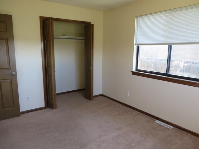 Building Photo - 3 bedroom Ranch Style Duplex backing to open space.