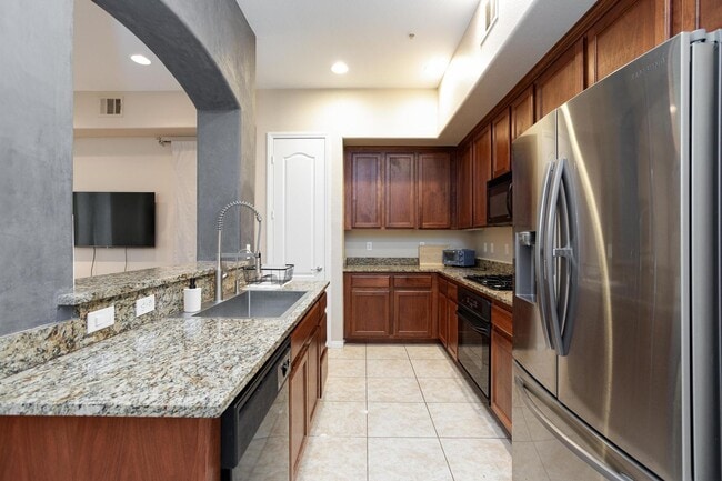 Building Photo - Partially Furnished Condo | Gourmet Kitchen, Pool & Fitness Center | 6-Month Lease Available