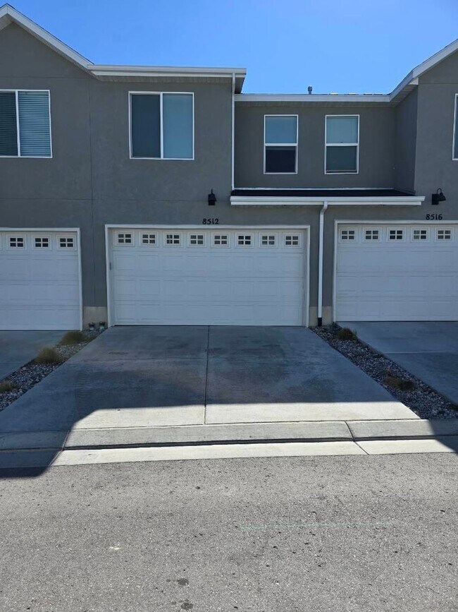 Building Photo - Nearly New, Well Appointed Modern Townhouse w 2 car attached garage