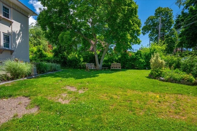Building Photo - Rare opportunity to lease this Frank Lloyd Wright-inspired Colonial in the highly sought-after Ha...