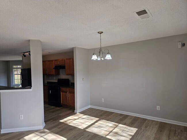 Building Photo - Move In special! 1/2 off the first Months rent!! 2 Bedrooms, 2.5 Baths Townhouse located in a Qui...