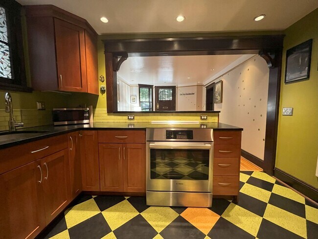 Building Photo - Charming NW Portland 1-Bedroom with Brick Accents & Modern Touches