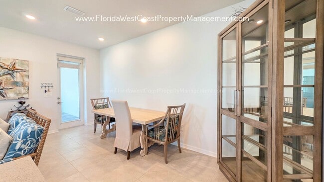 Building Photo - EXCEPTIONAL AND SPACIOUS FURNISHED TOWNHOME WITHIN WATERSIDE- NAUTIQUE!