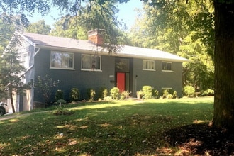 Building Photo - Modern & Bright Raised Ranch Near Downtown