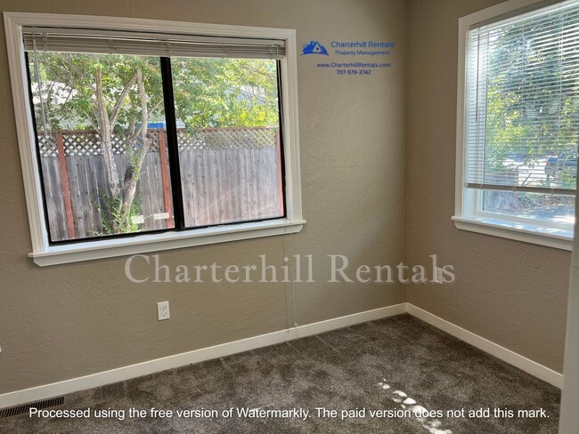 Building Photo - Move in special! Charming, updated home in...