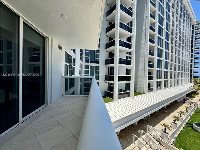 Building Photo - 10275 Collins Ave