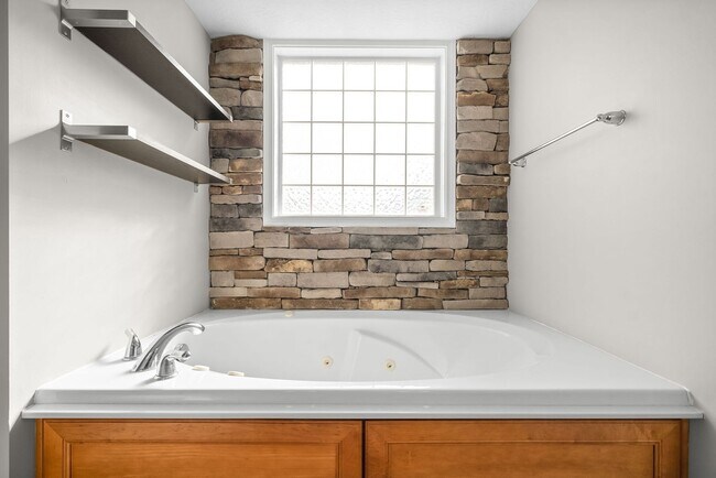 Building Photo - Pet Friendly Three Bedroom with Bonus!