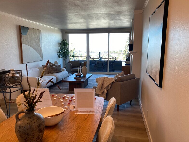 Available Unfurnished but shown furnished - 5340 Broadway Ter