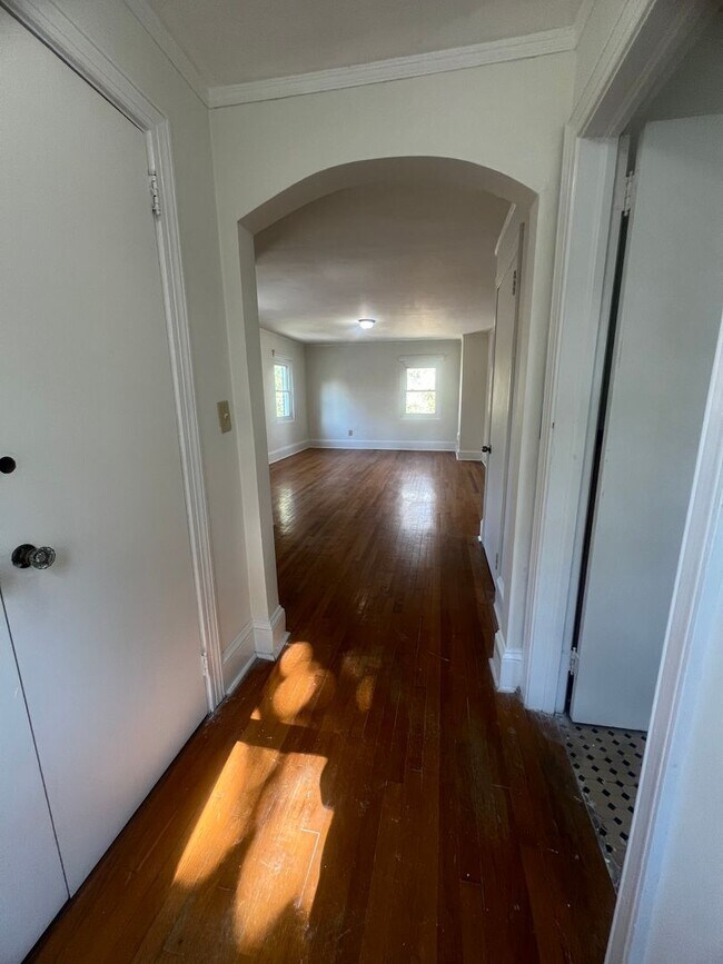 Building Photo - Spacious 4-Bedroom Brick Home with Hardwood Floors and Walk-In Closet