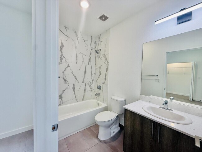 Building Photo - 1295 W 69th St