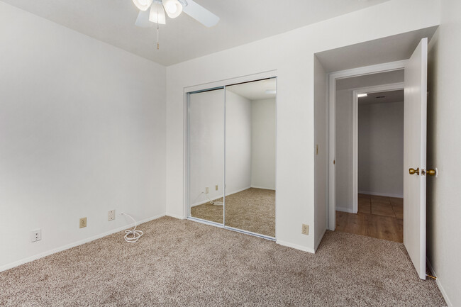 Downstairs bedroom w/ceiling fan - 3748 W Carol Ann Way