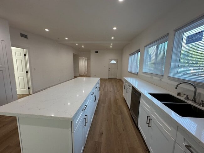 Building Photo - Completely remodeled 4+2 sprawled across a charming street in a beautiful pocket of Reseda