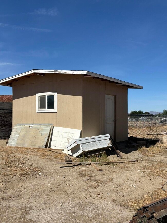Building Photo - 10136 E Ave Q-10