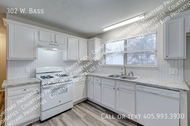 Building Photo - 302 W. Bass-