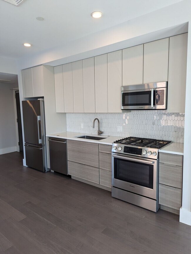 Building Photo - Jamaica Plain spacious studio w/ central a...