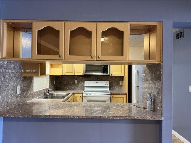 Building Photo - 6640 W 24th Ct