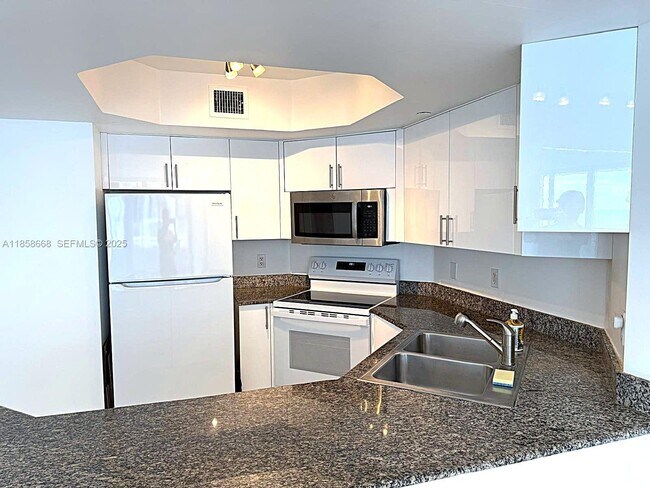 Building Photo - 8911 Collins Ave