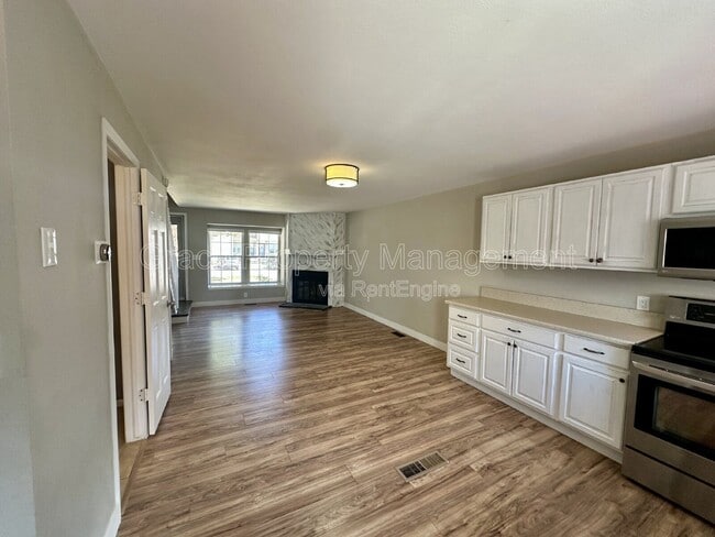 Building Photo - 9616 W Chatfield Ave