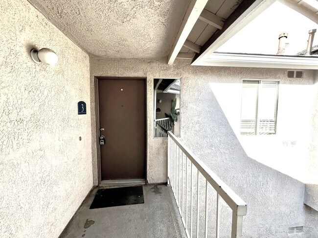 Building Photo - 2 Bedroom, 2 Bath Upstairs Condo with Private Balcony & 2-Car Garage, Gated Community, Water/Tras...