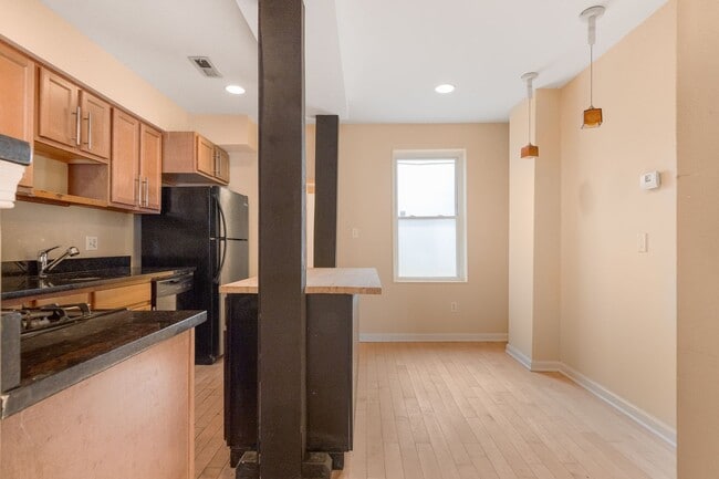 Building Photo - Spacious 2BR/2.5BA Townhome with Finished Basement & Extra Storage