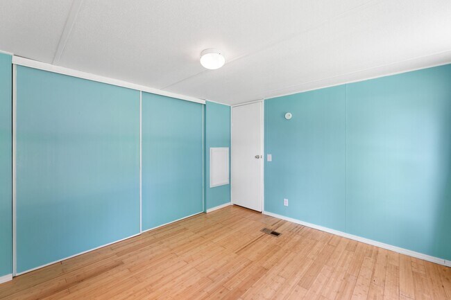 Building Photo - Updated mobile home on acre lot with garag...