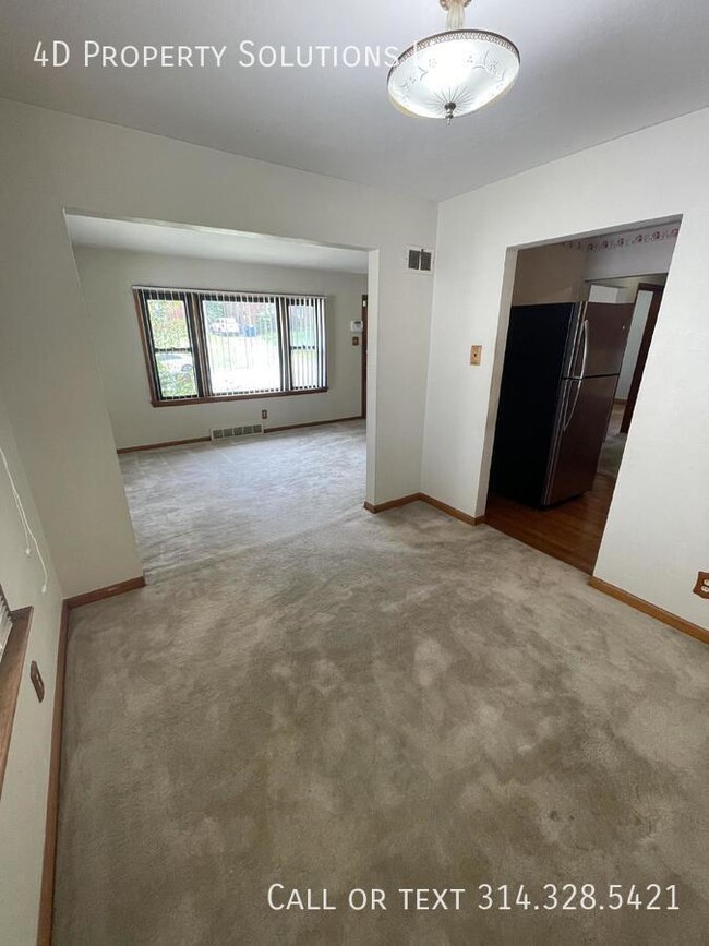 Building Photo - Welcoming 4-Bed Home with Finished Basemen...