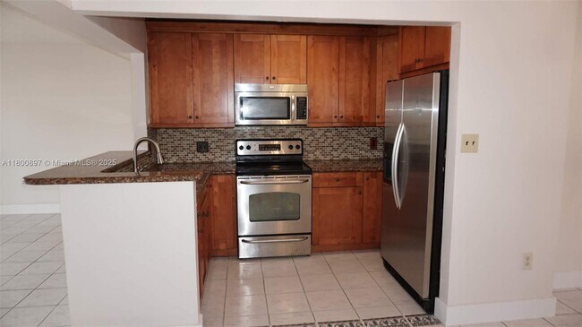 Building Photo - 4909 SW 144th Ct