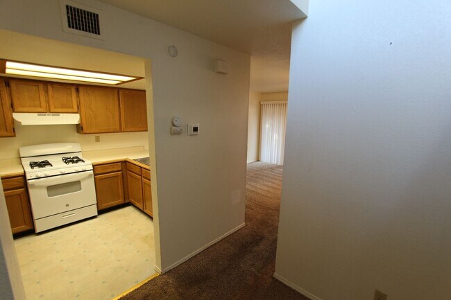 Building Photo - Bright 2BR Townhome in Boyington Heights | Private Balcony + Fenced Backyard