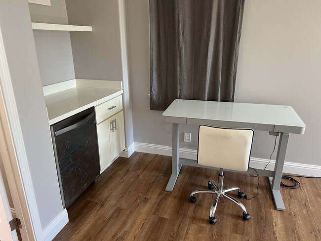 Desk and refrigerator - 2328 Le Conte Ave