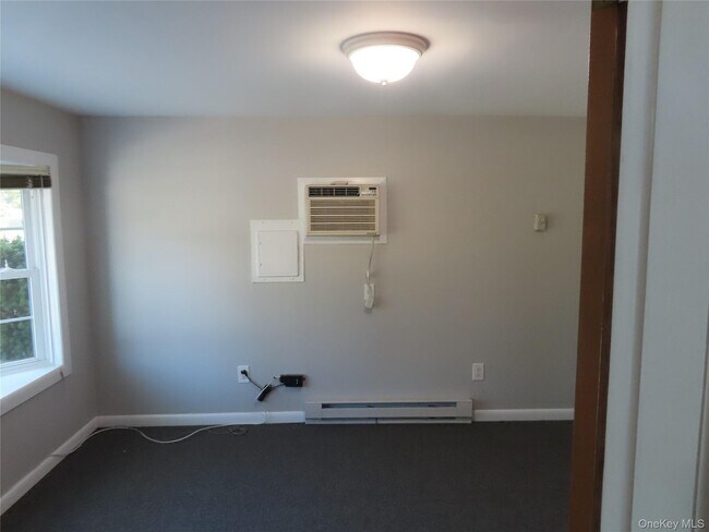 Building Photo - 1210 Smithtown Ave