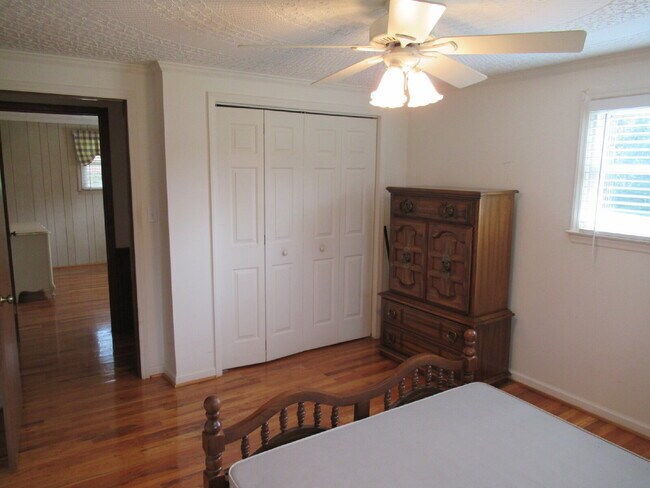 Building Photo - Charming All-Brick Ranch with Finished Bas...