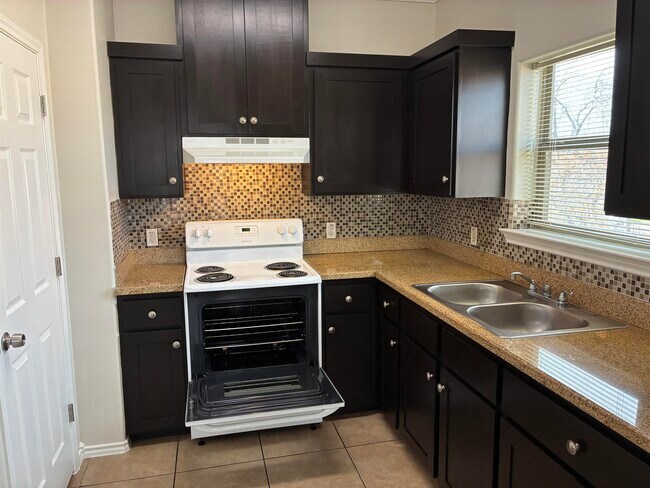 Building Photo - 5402 Marcella Ave