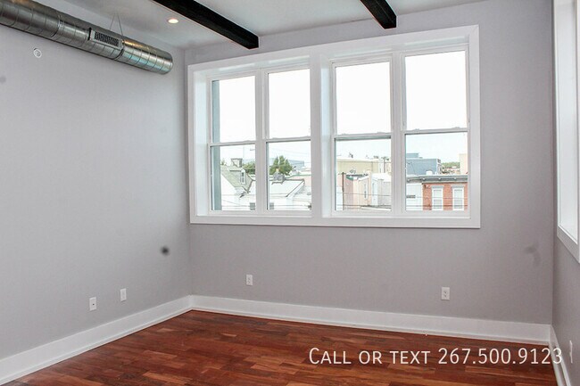 Building Photo - 1025 E Montgomery Ave