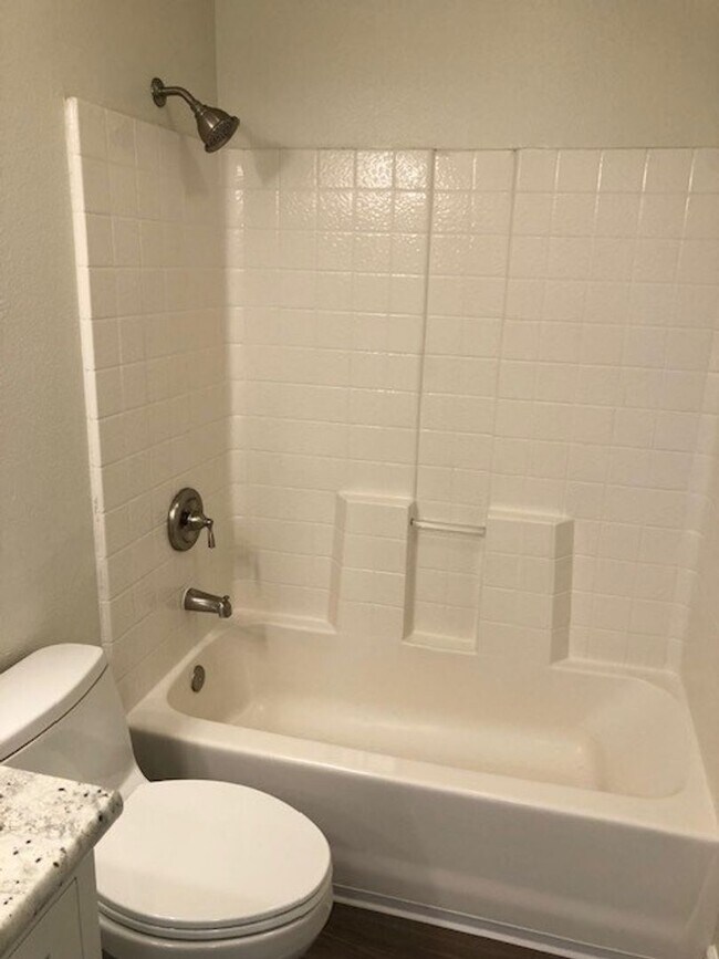 Building Photo - PICTURE PERFECT 2 BR/2 BATH PLUS LOFT END UNIT CONDO WITH DIRECT ACCESS 2 CAR GARAGE