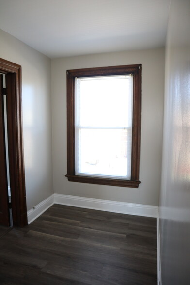 Second floor hallway offers additional space for a desk, reading nook, or toys - 715 Clinton Pl