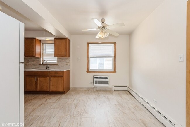 Building Photo - 4752 N Menard Ave