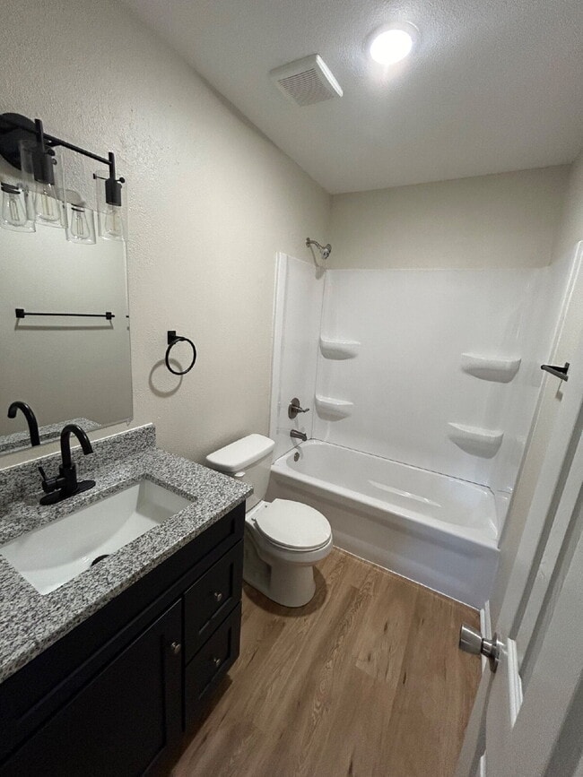 Building Photo - "Charming 4-Bedroom Retreat with Granite T...