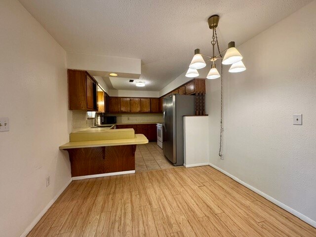 Building Photo - 205 E Henson Ave
