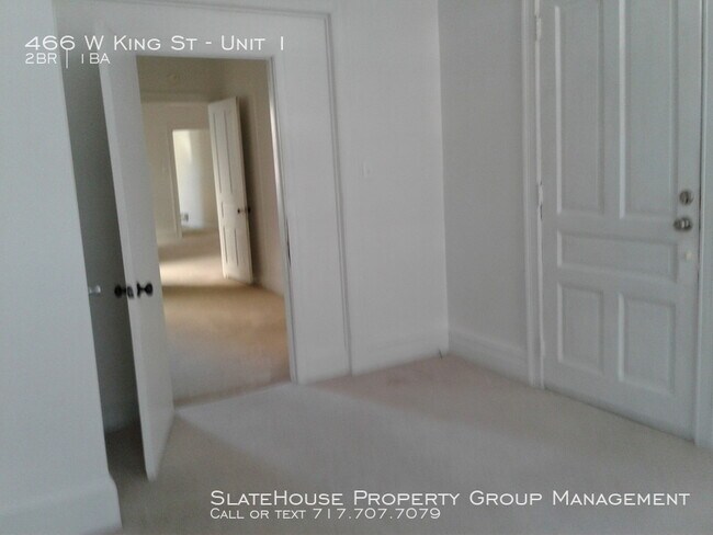Building Photo - First floor two bedroom with yard!