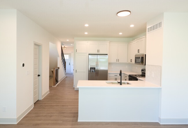 Looking from Kitchen to Front Door - Eagle Creek Townhomes